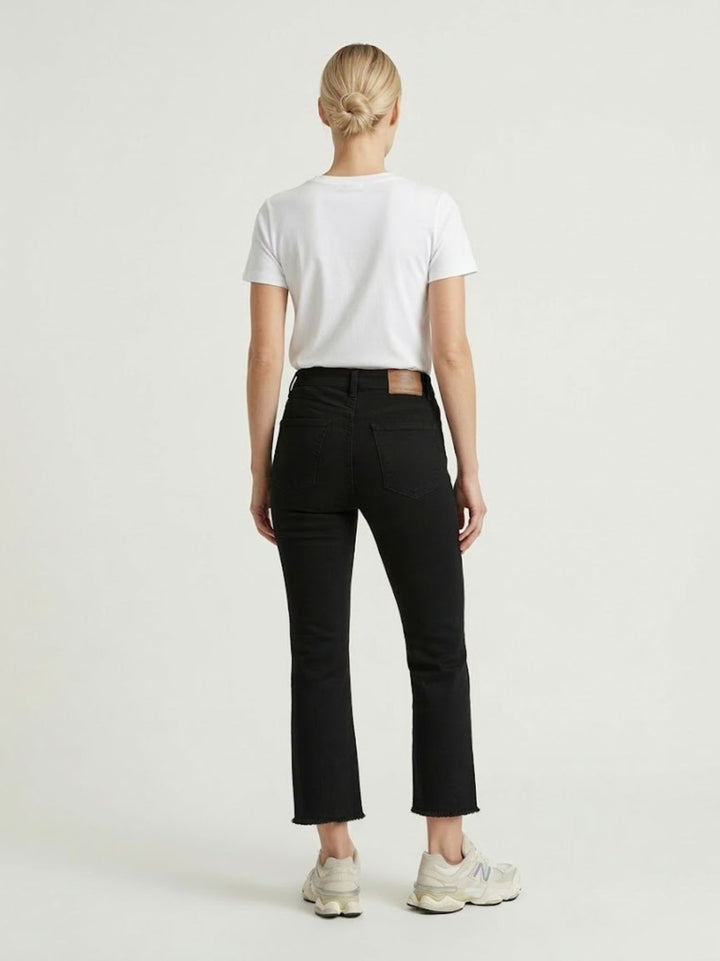 Pantalone a trombetta sfrangiato in cotone nero