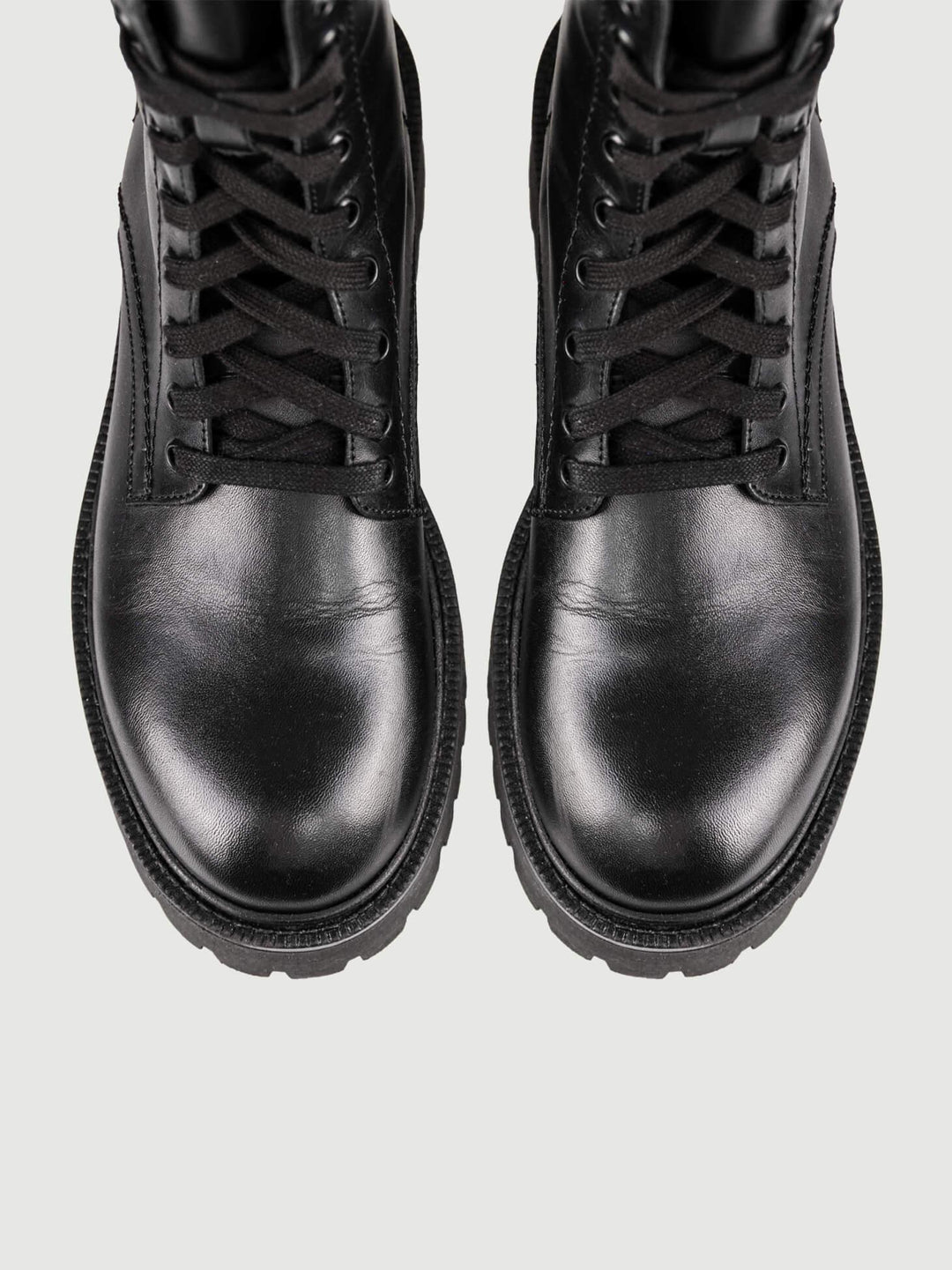 ANFIBIO IN PELLE CON ZIP POSTERIORE