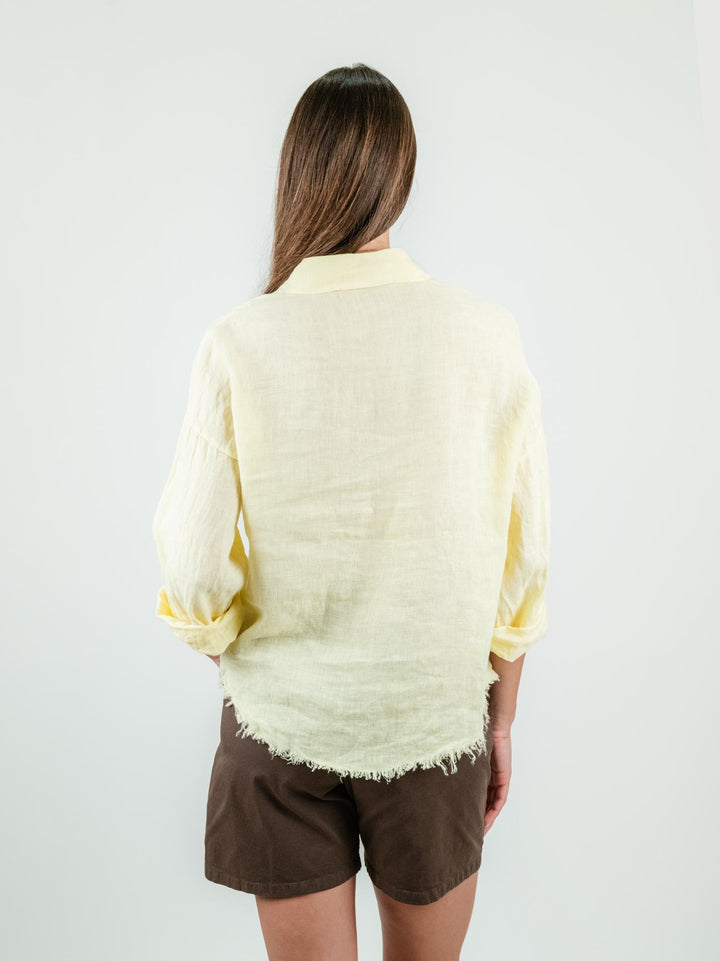 CAMICIA IN LINO GIALLA CON FONDO SFRANGIATO