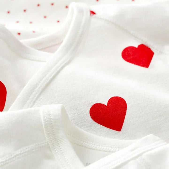CONFEZIONE DA 3 BODY INCROCIATI IN COTONE CON MOTIVO A CUORE