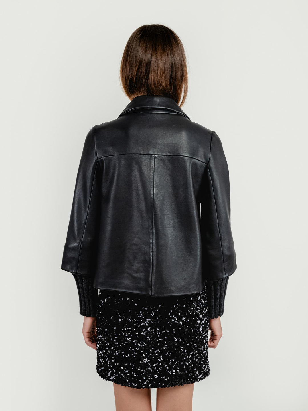 GIACCA GEMINI IN PELLE NERA CON MANICHE IN MAGLIA