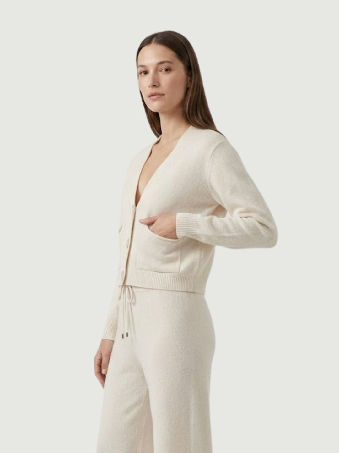 Cardigan cropped in maglia panna 057090 0071 BIMOR 