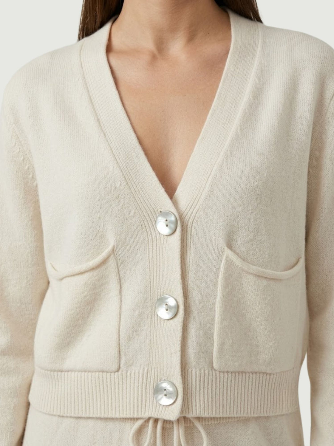 Cardigan cropped in maglia panna 057090 0071 BIMOR 