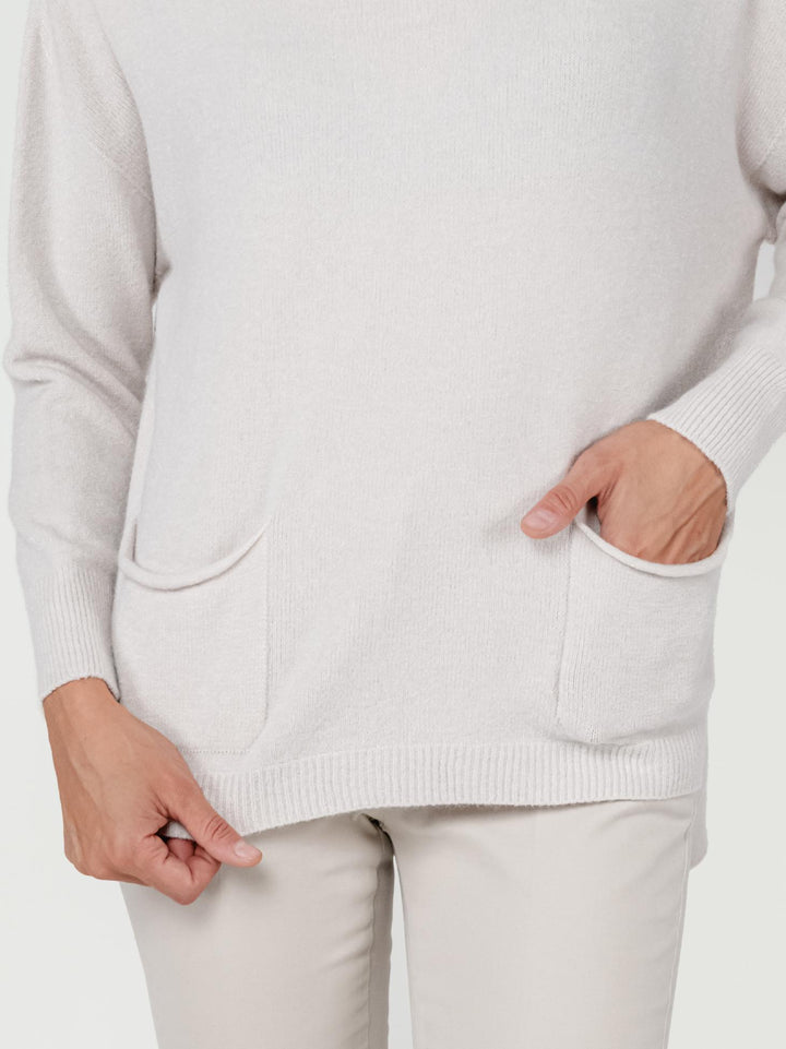 MAGLIA LUNGA CON TASCHE E CAPPUCCIO PANNA