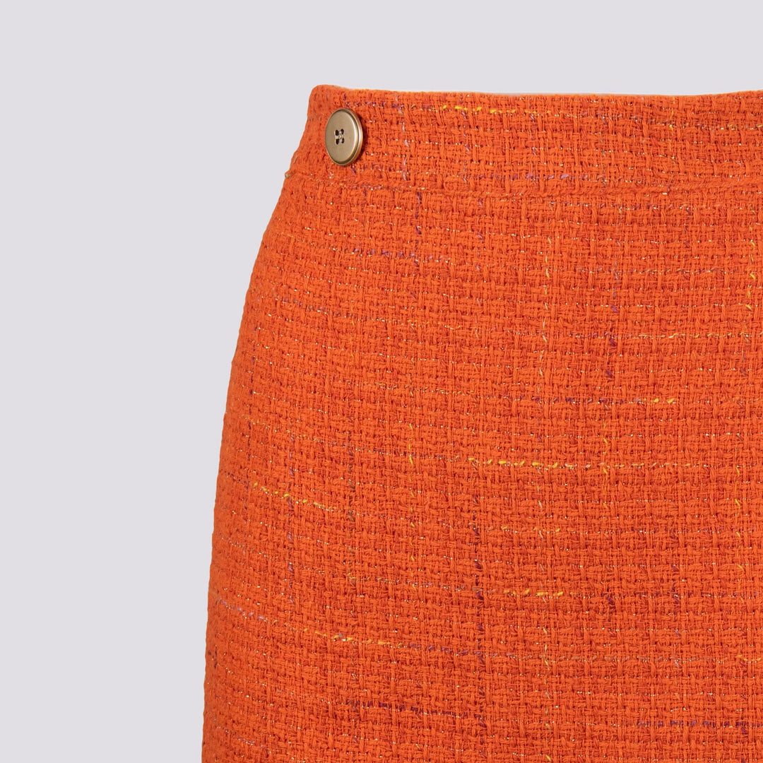 MINIGONNA IN BOUCLE CON BOTTON