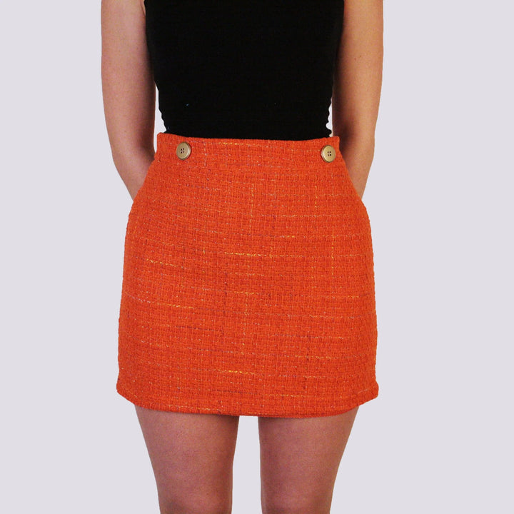 MINIGONNA IN BOUCLE CON BOTTON