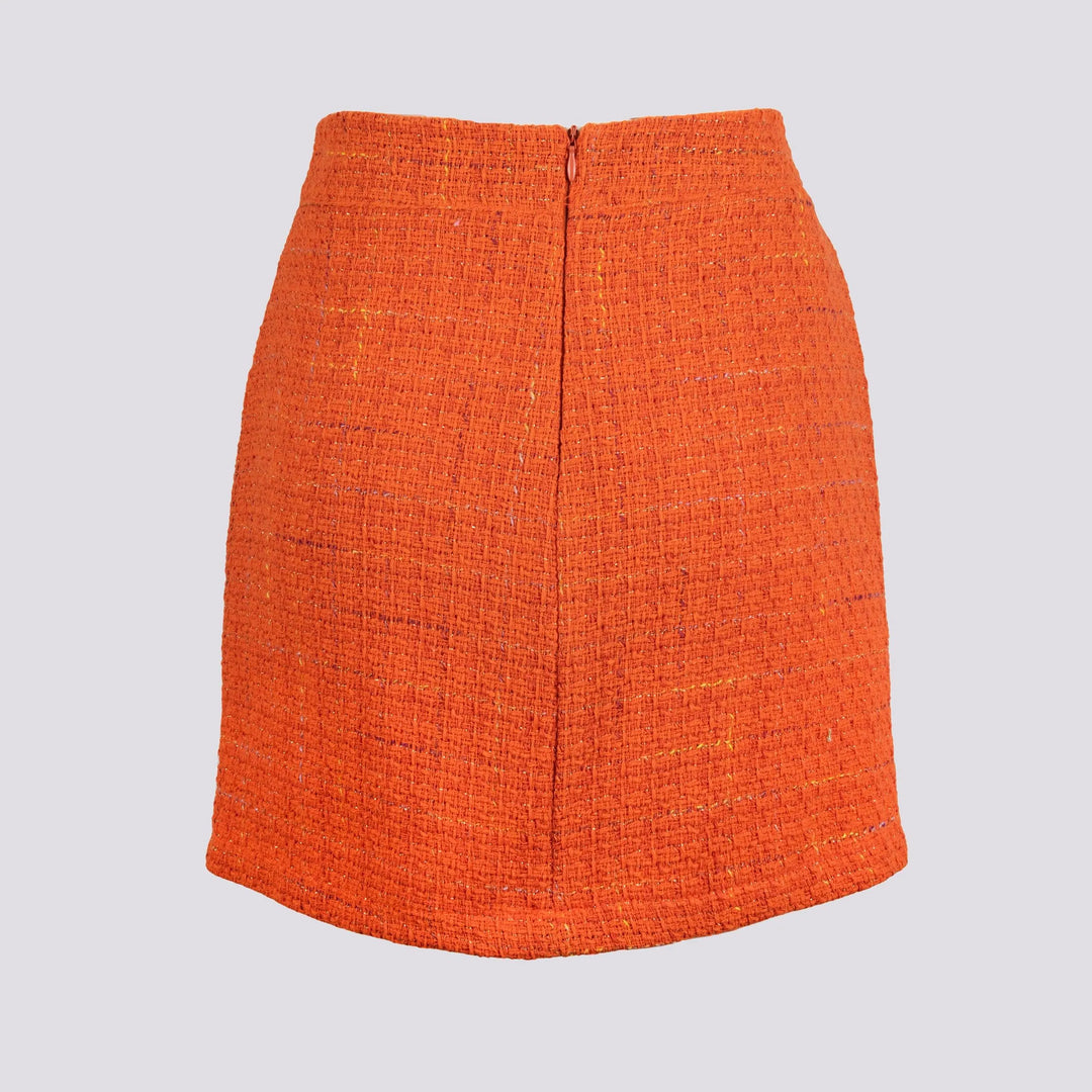 MINIGONNA IN BOUCLE CON BOTTON
