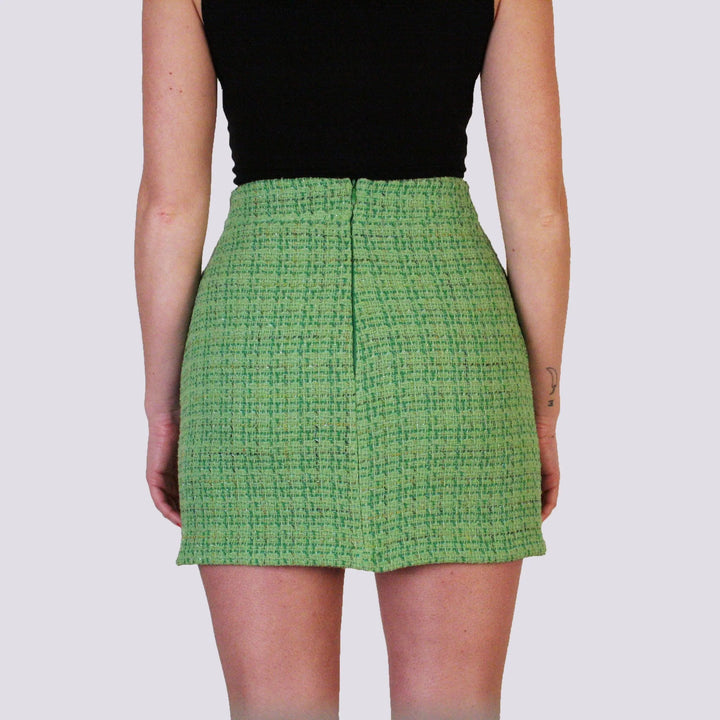 MINIGONNA IN BOUCLE CON BOTTON