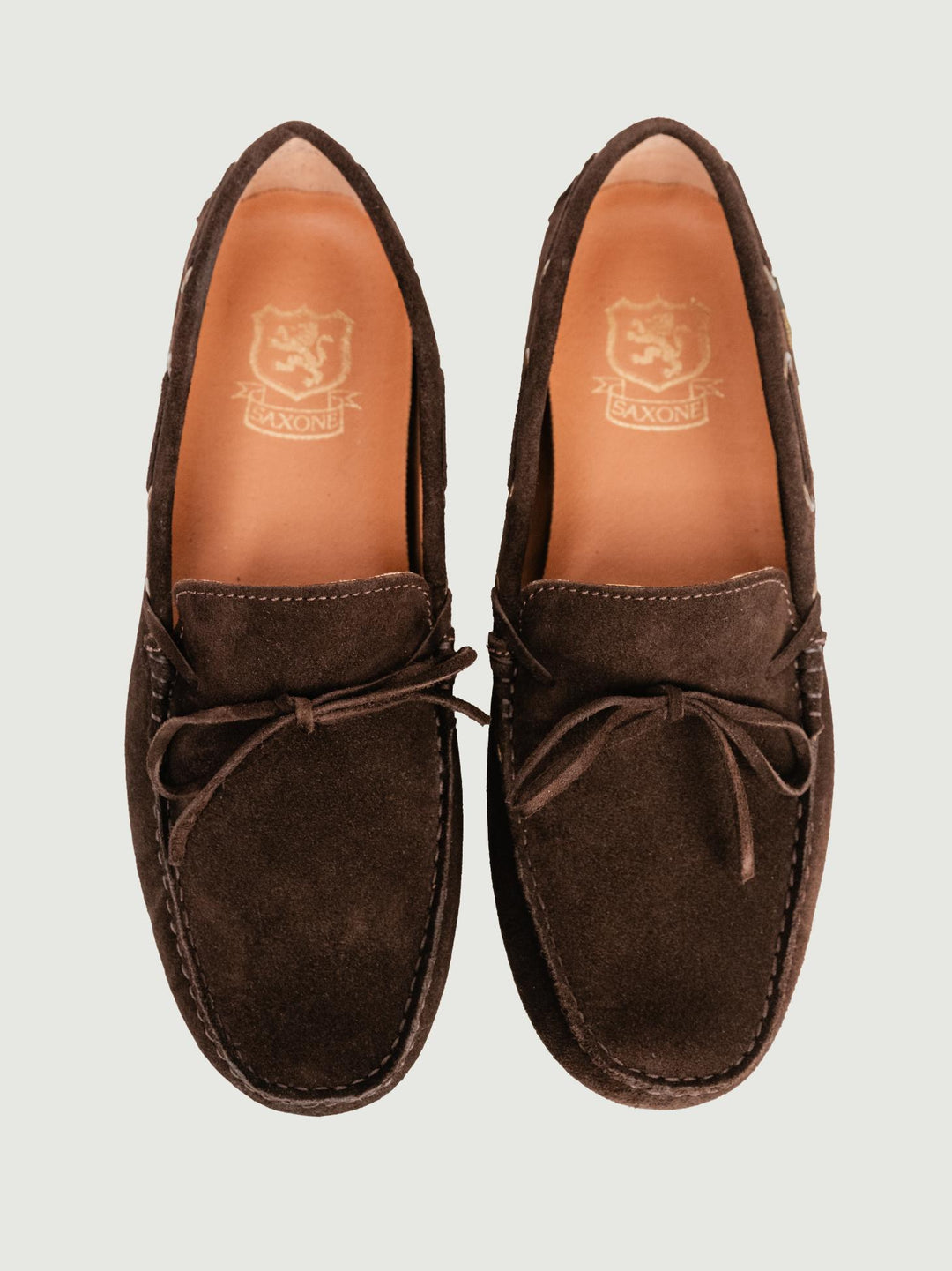 MOCASSINO CON GOMMINI IN CAMOSCIO TESTA MORO