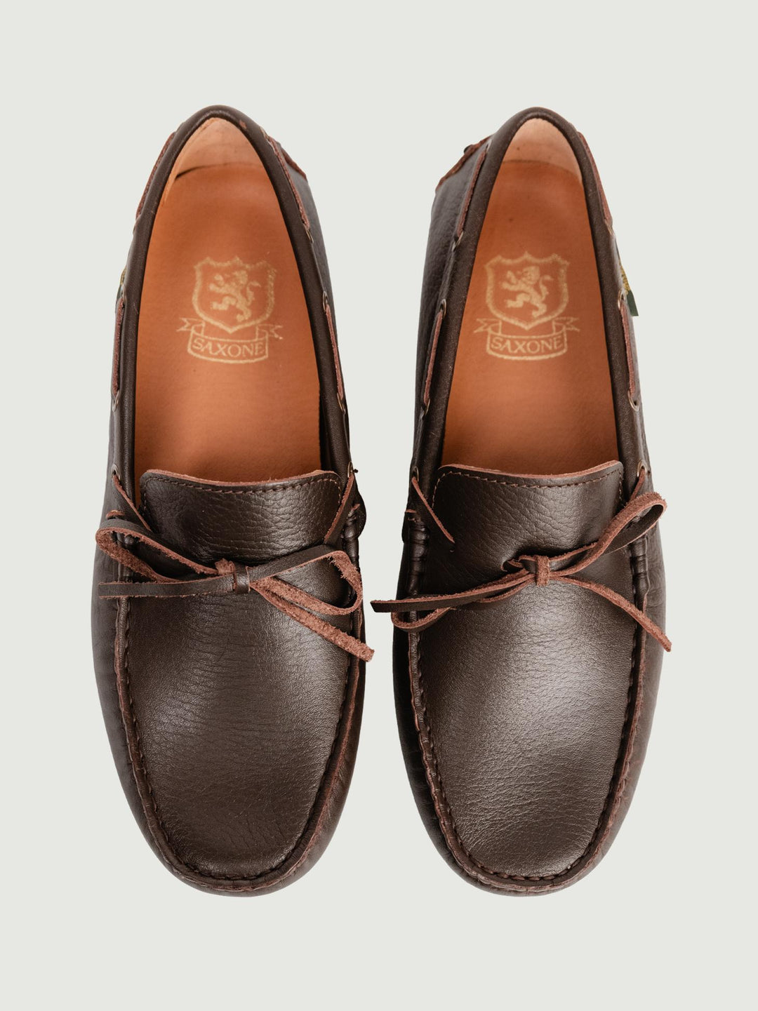 MOCASSINO CON GOMMINI IN TESTA MORO