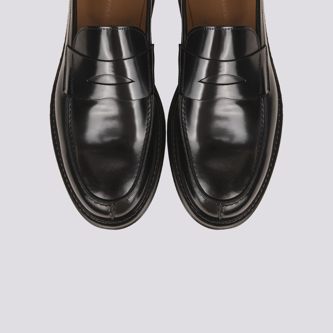 MOCASSINO CON PENNY FRONTALE IN PELLE SPAZZOLATA NERA