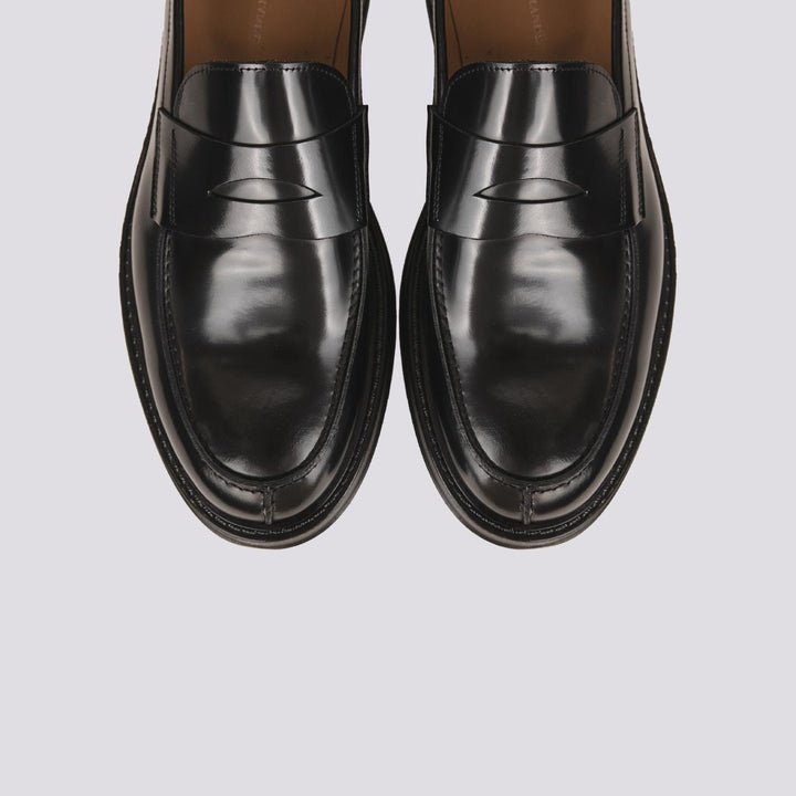 MOCASSINO CON PENNY FRONTALE IN PELLE SPAZZOLATA NERA