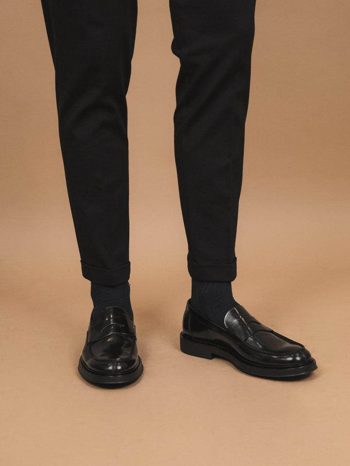 MOCASSINO CON PENNY FRONTALE IN PELLE SPAZZOLATA NERA