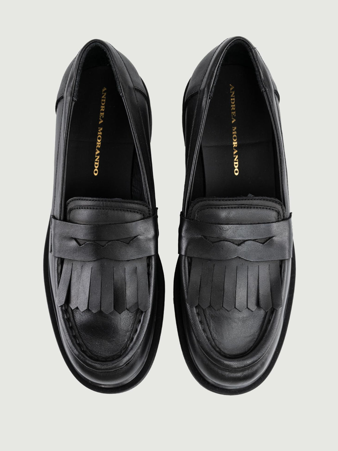 MOCASSINO PENNY CON FRANGE IN PELLE NERA
