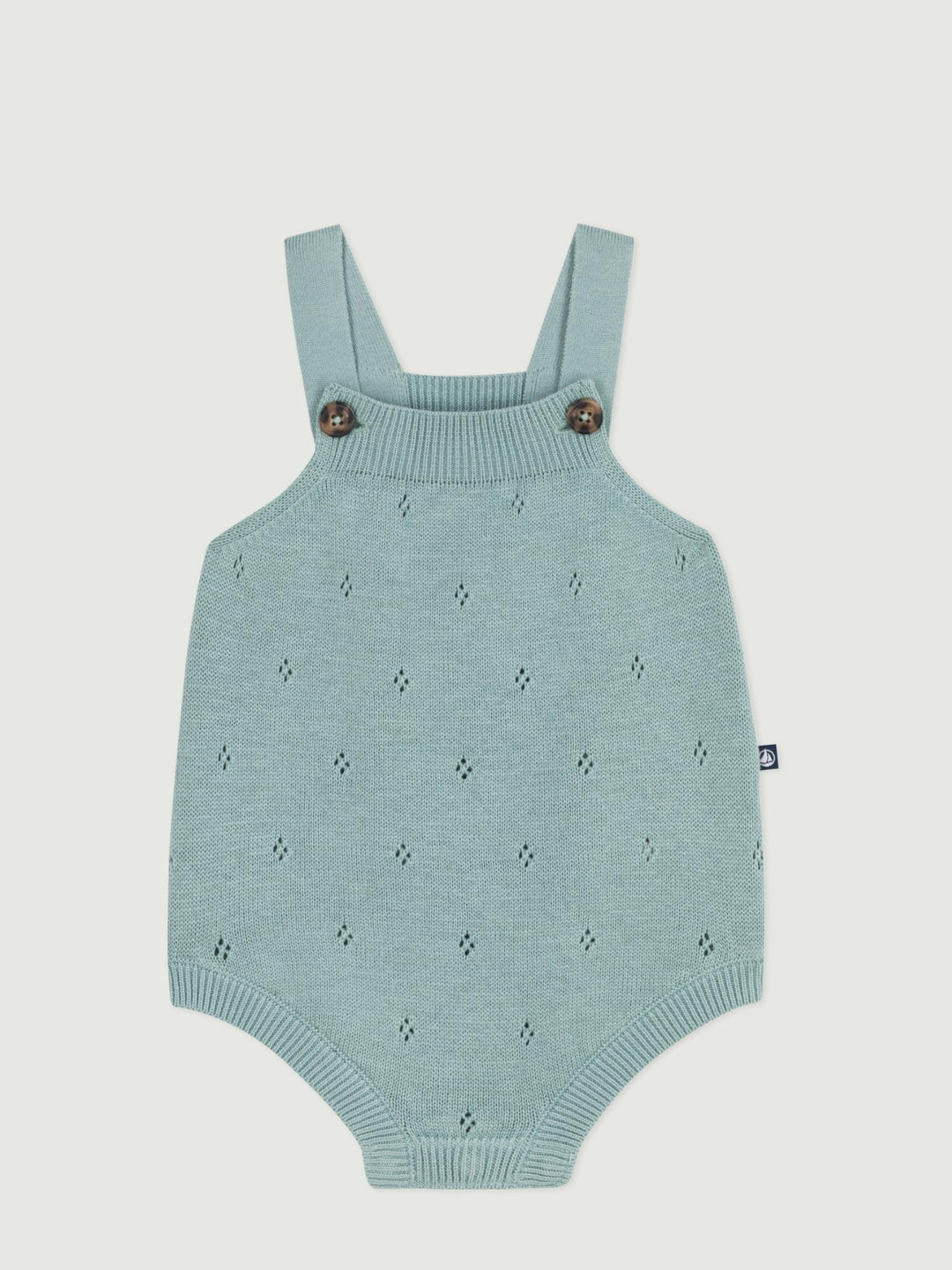 Pagliaccetto neonato in maglia con spalline