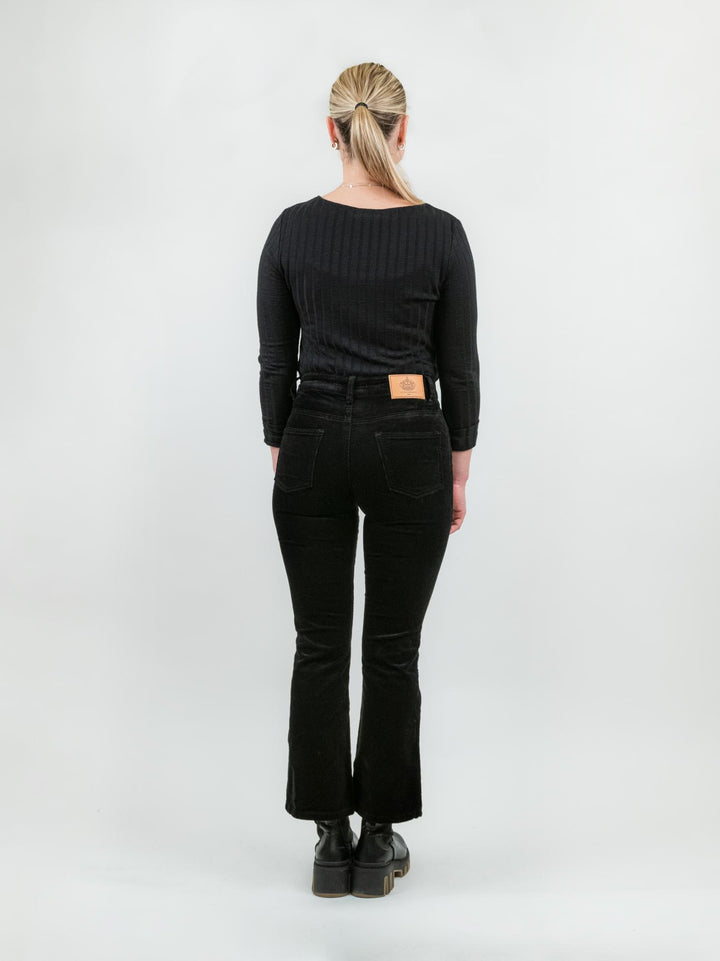 Pantalone cinque tasche a trombetta in velluto nero