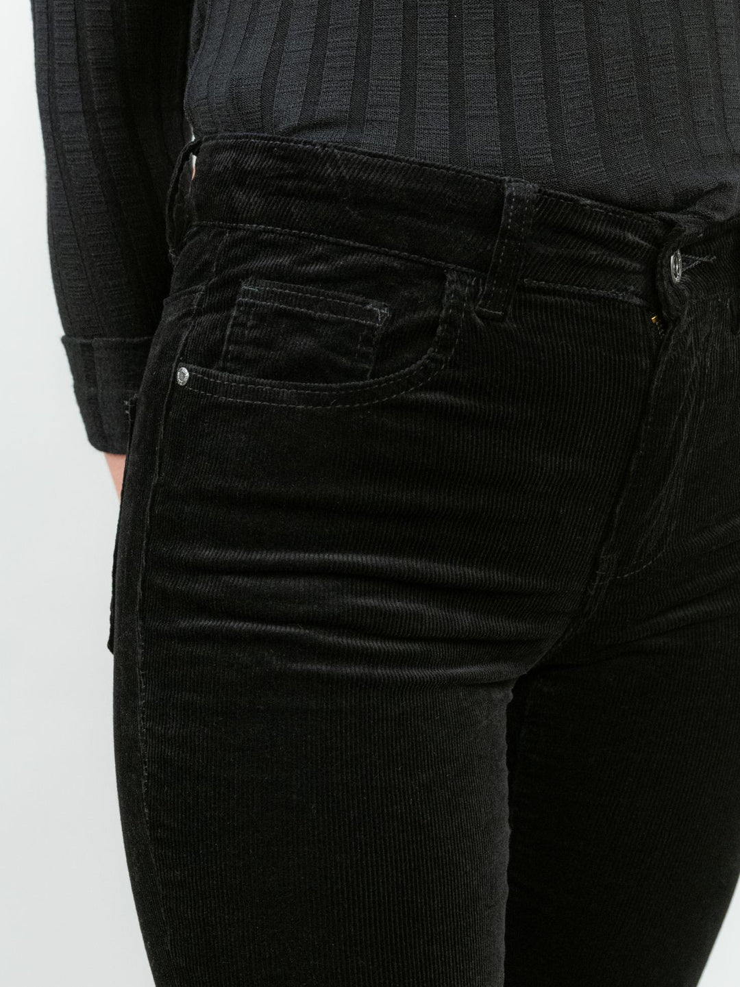 Pantalone cinque tasche a trombetta in velluto nero