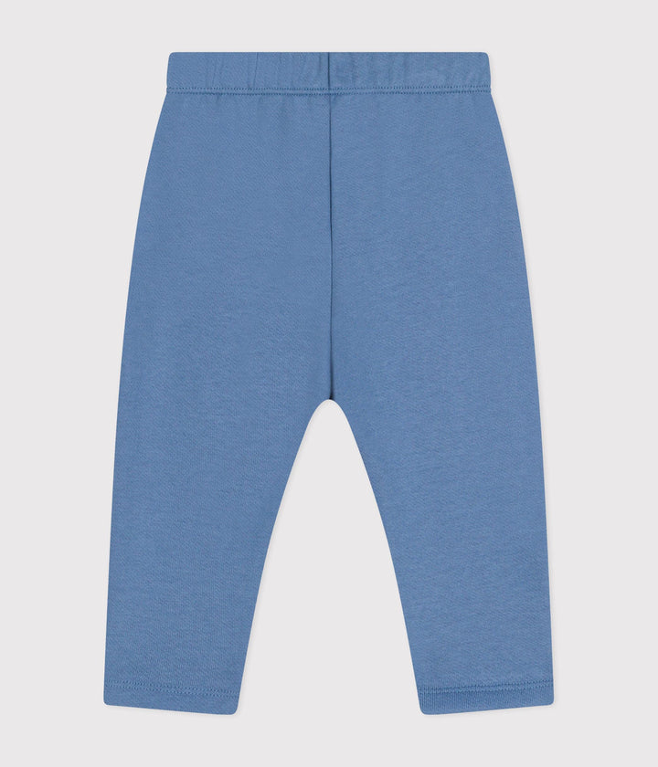 Pantaloni tinta unita bluette in tessuto felpato