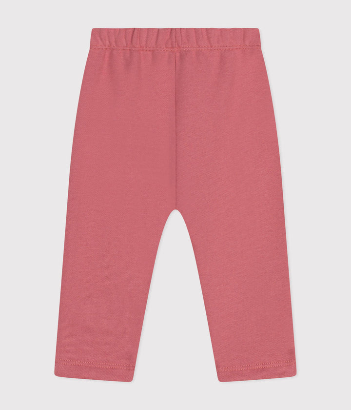 Pantaloni tinta unita rosa in tessuto felpato