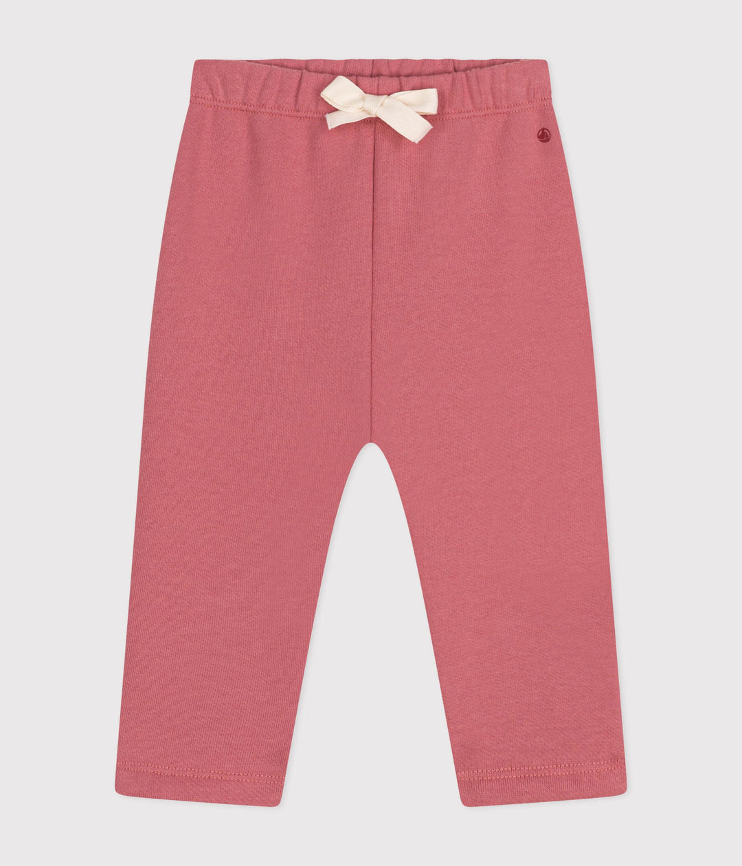 Pantaloni tinta unita rosa in tessuto felpato
