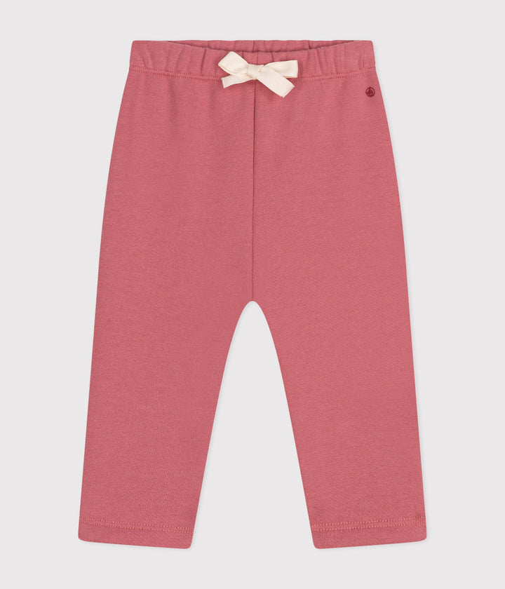 Pantaloni tinta unita rosa in tessuto felpato
