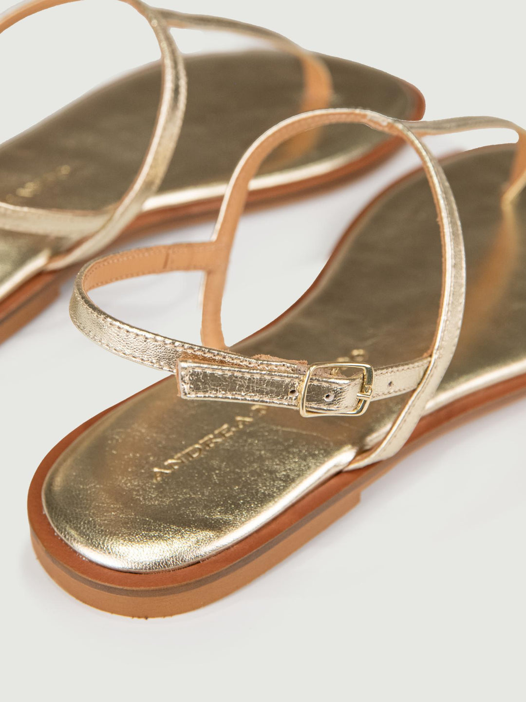 SANDALO INFRADITO IN PELLE ORO