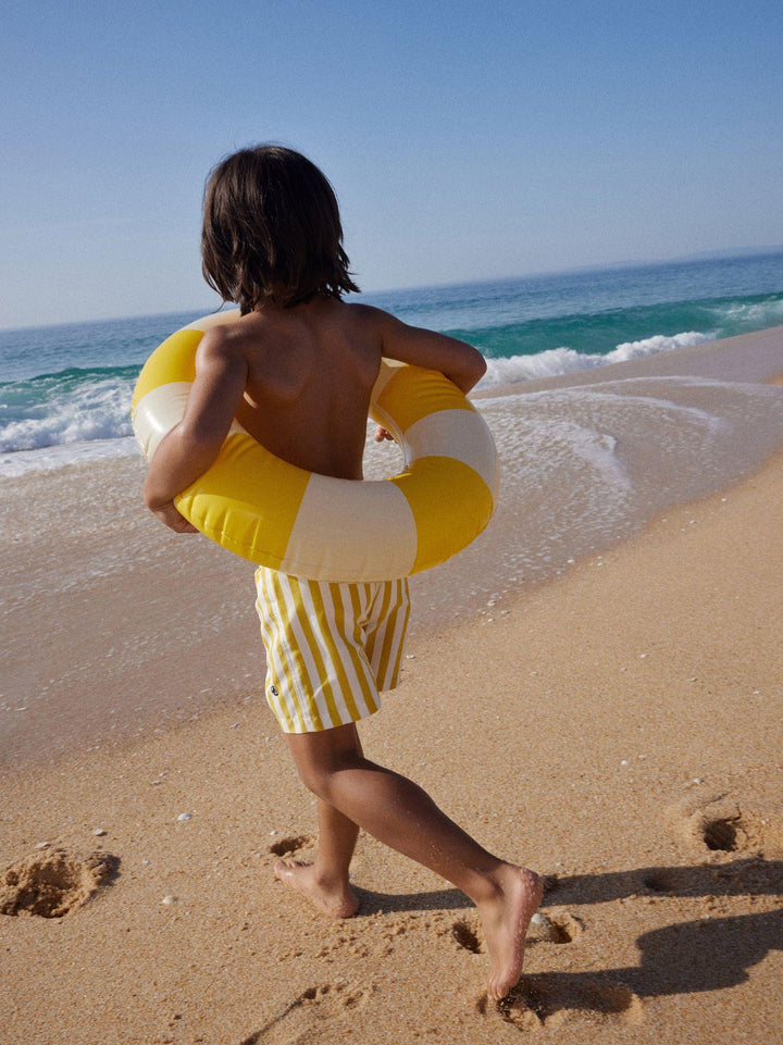 SHORTS DA MARE STAMPATO A RIGHE GIALLI BAMBINO