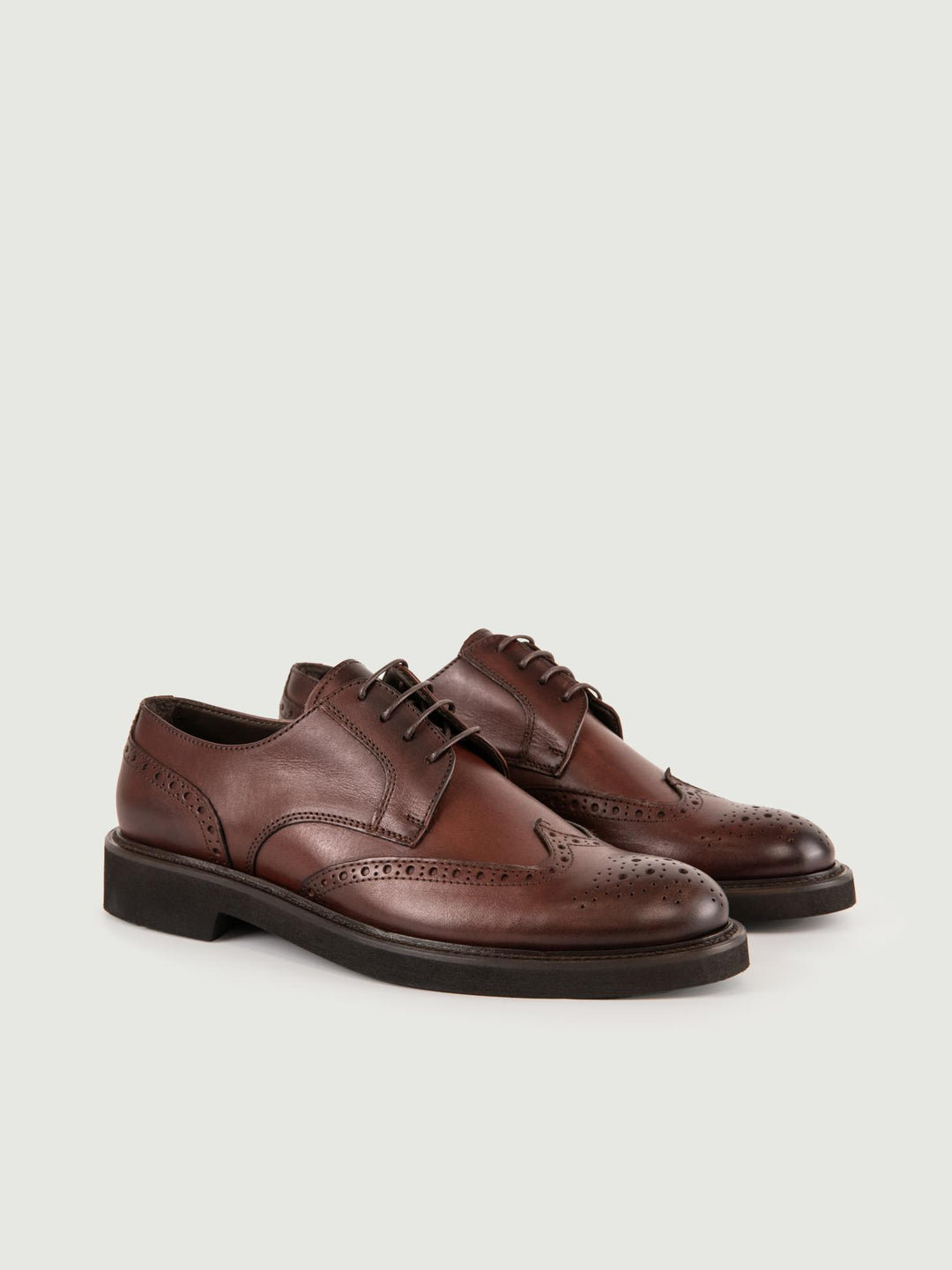 STRINGATA IN PELLE MARRONE CODA DI RONDINE