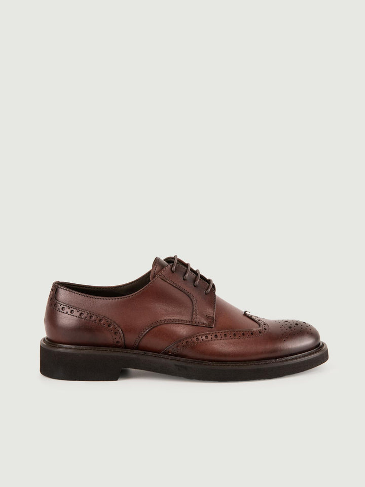 STRINGATA IN PELLE MARRONE CODA DI RONDINE