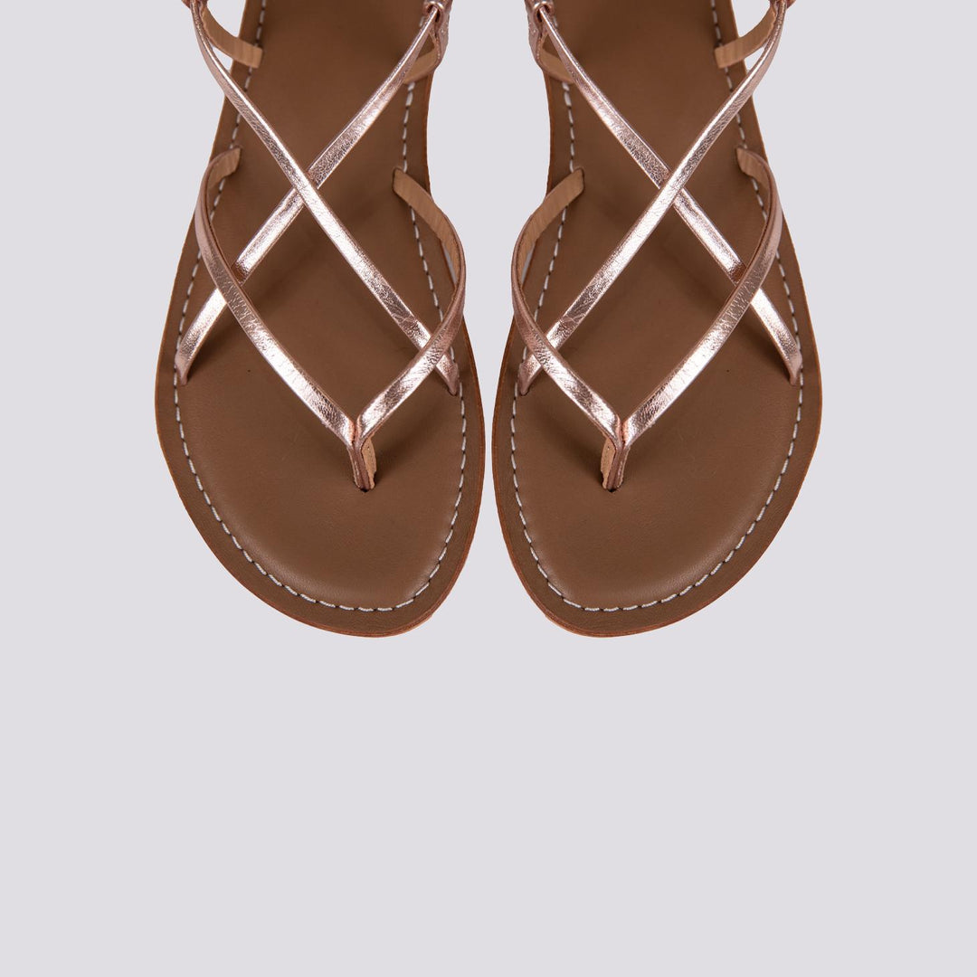 Sandalo in pelle laminata rosa con lacci modello schiava