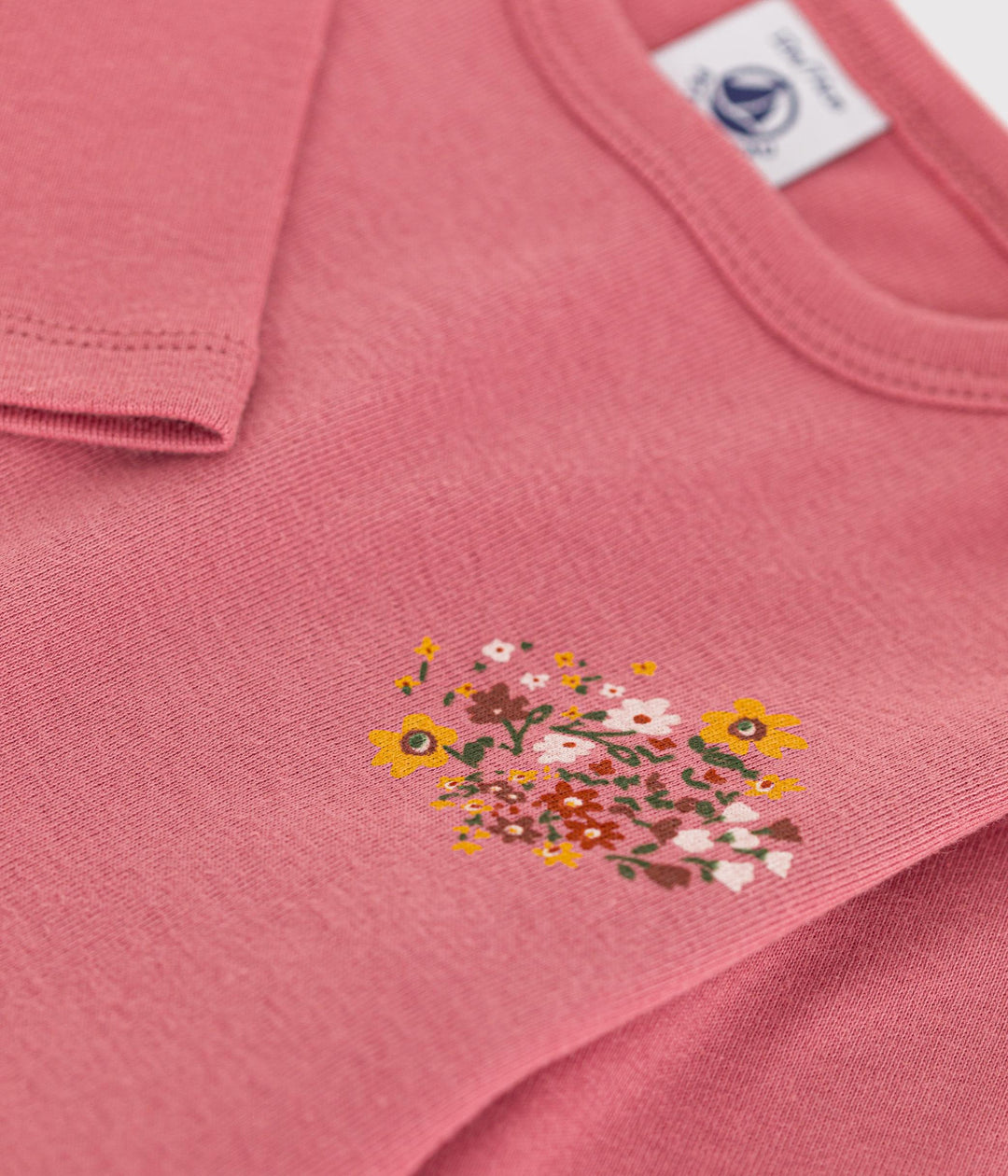 T-shirt rosa con stampa fiorellini a maniche lunghe
