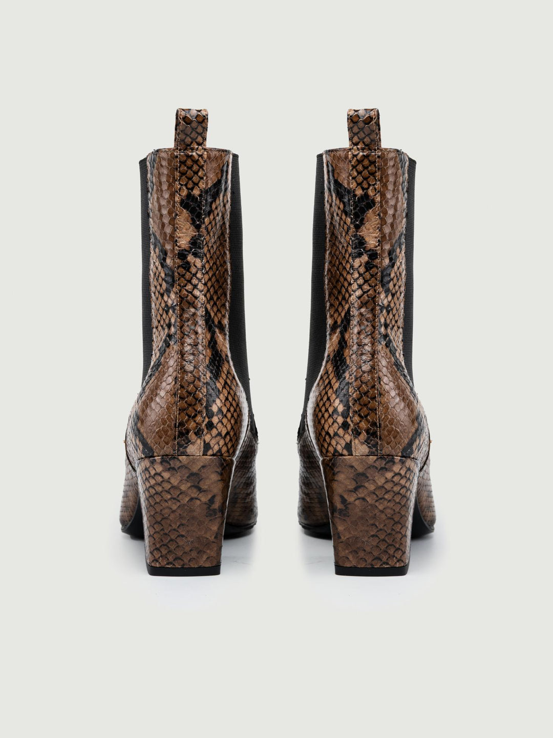 TRONCHETTO CON INSERTI ELASTICI E STAMPA PITONE MARRONE