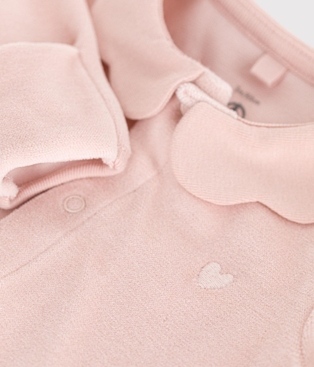 Tutina in velluto rosa per bebè