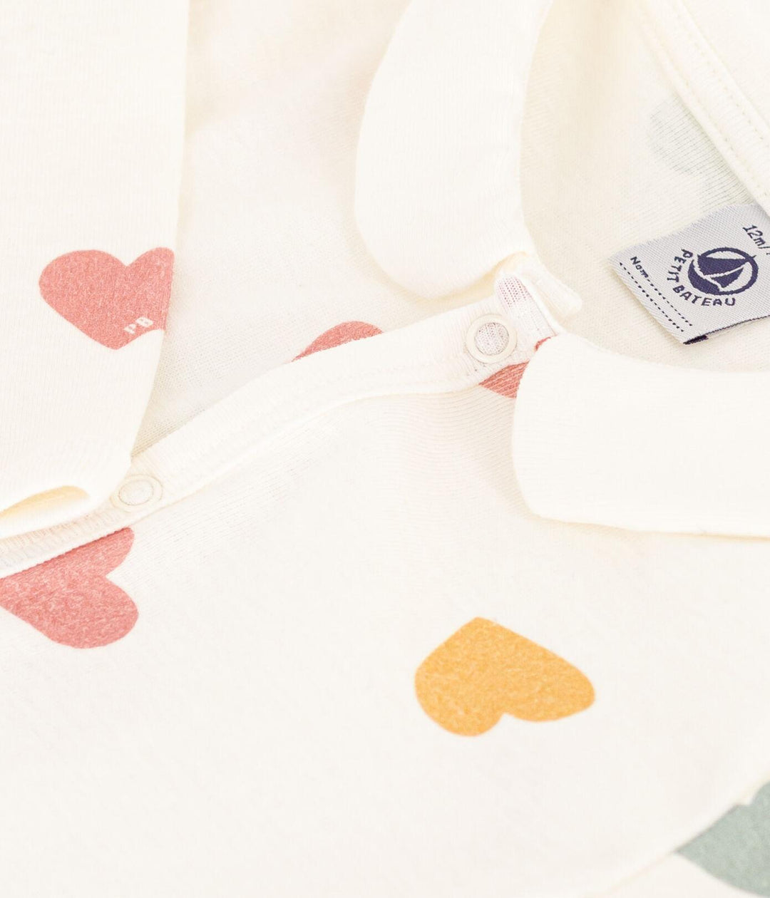 PIGIAMA BEBÈ SENZA PIEDI A CUORI MULTICOLORI IN COTONE A086C 01 PETIT BATEAU 