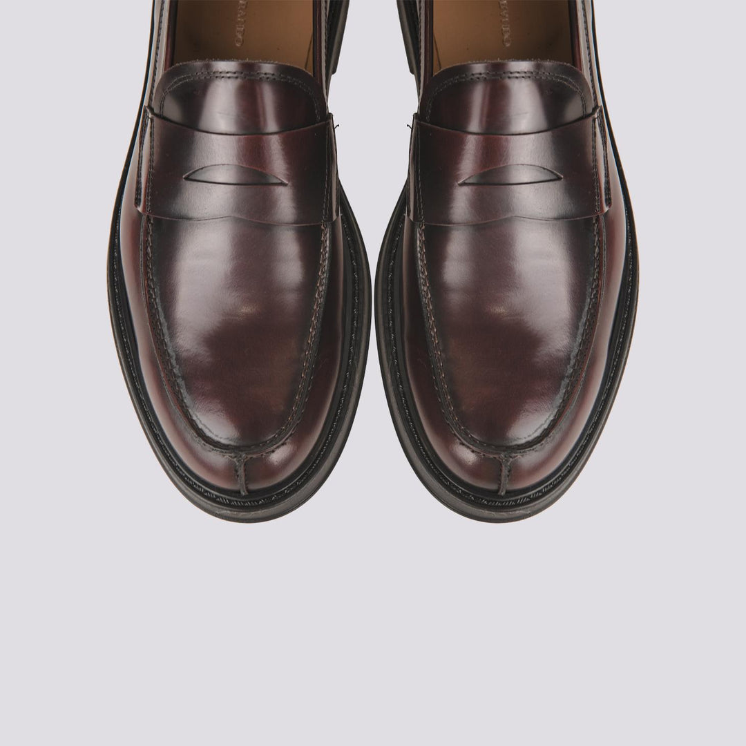 MOCASSINO CON PENNY FRONTALE IN PELLE SPAZZOLATA BORDEAUX