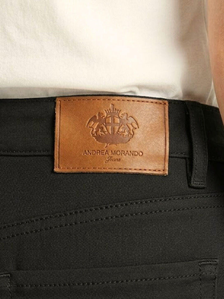 Pantalone a trombetta sfrangiato in cotone nero 80137G190 NERO ANDREA MORANDO 