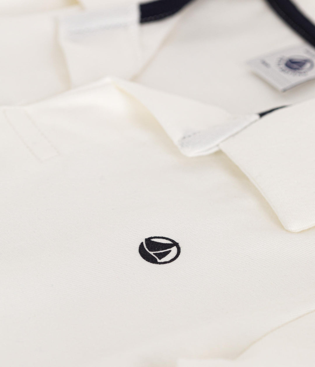 POLO BIANCA A MANICHE CORTE IN COTONE BAMBINO A0A1V 01 PETIT BATEAU 
