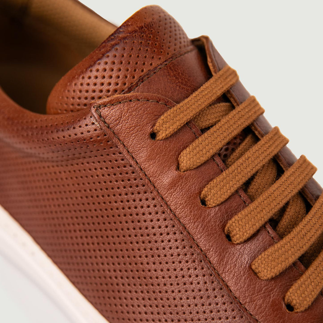 SNEAKER in pelle traforata cuoio effetto vintage
