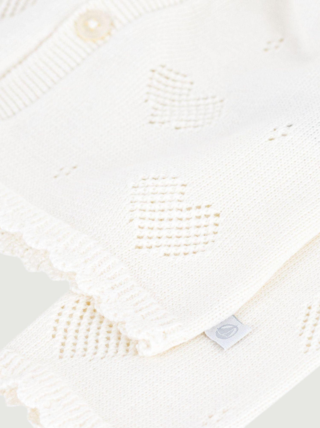 Cardigan in maglia traforata a cuori bianco A0EZT 01 PETIT BATEAU 