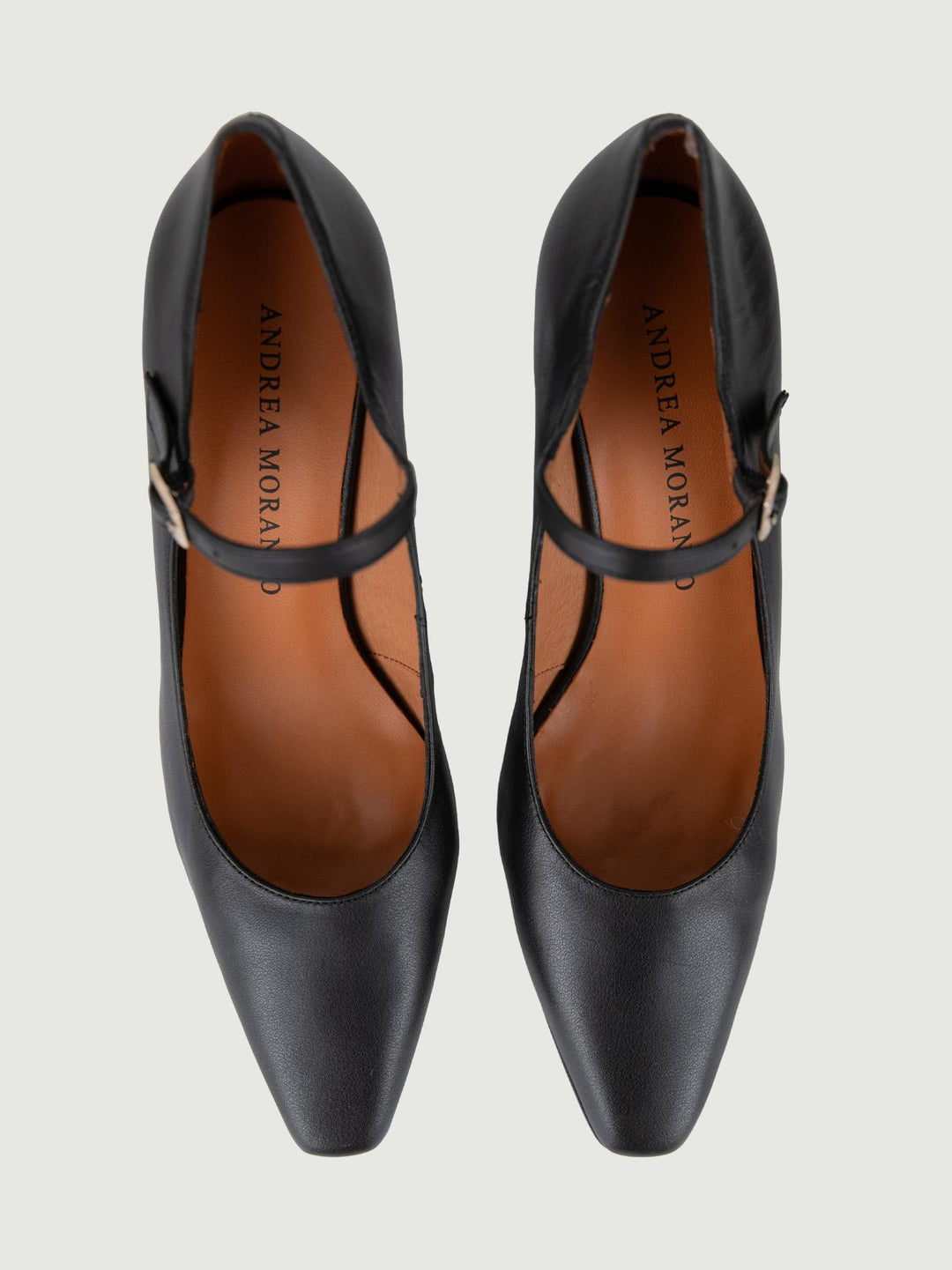 DÉCOLLETÉ IN PELLE NERA
