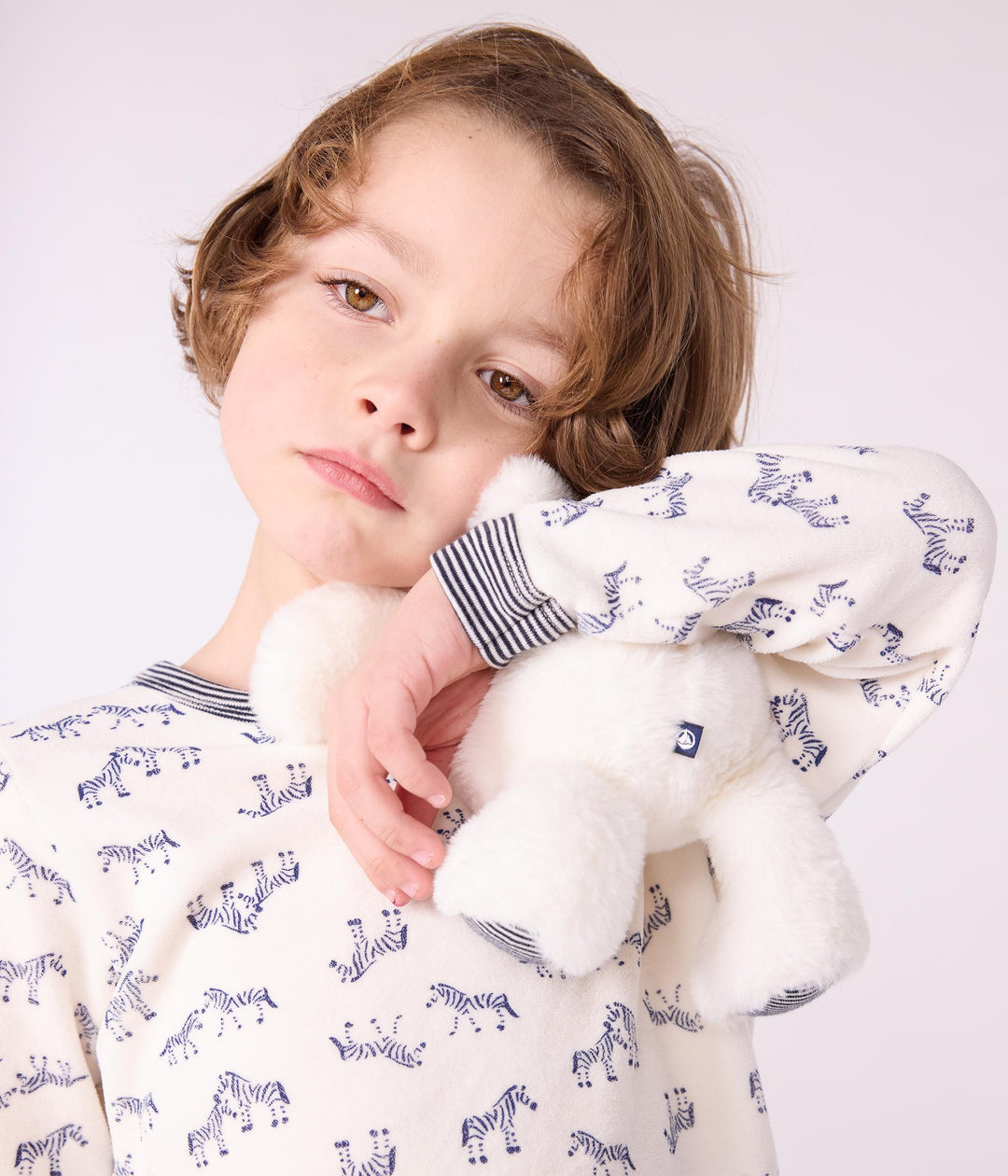 Pigiama in ciniglia con zebre stampate bambino A0DRZ 01 PETIT BATEAU 