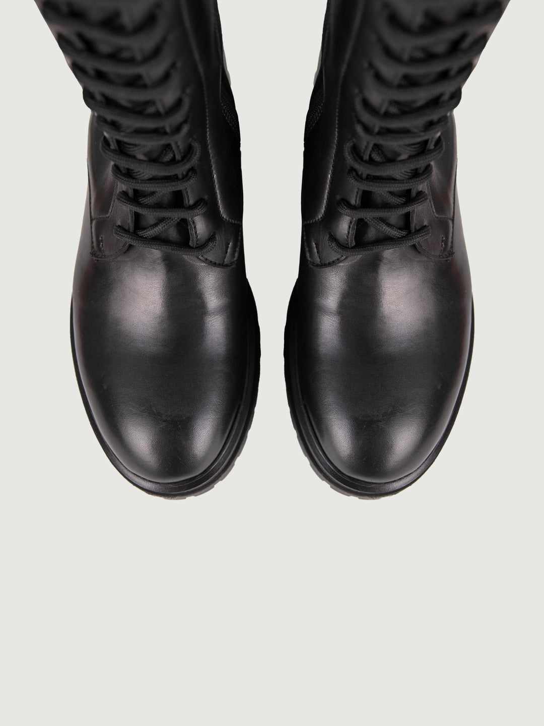 ANFIBIO ALTO IN PELLE NERA CON ZIP