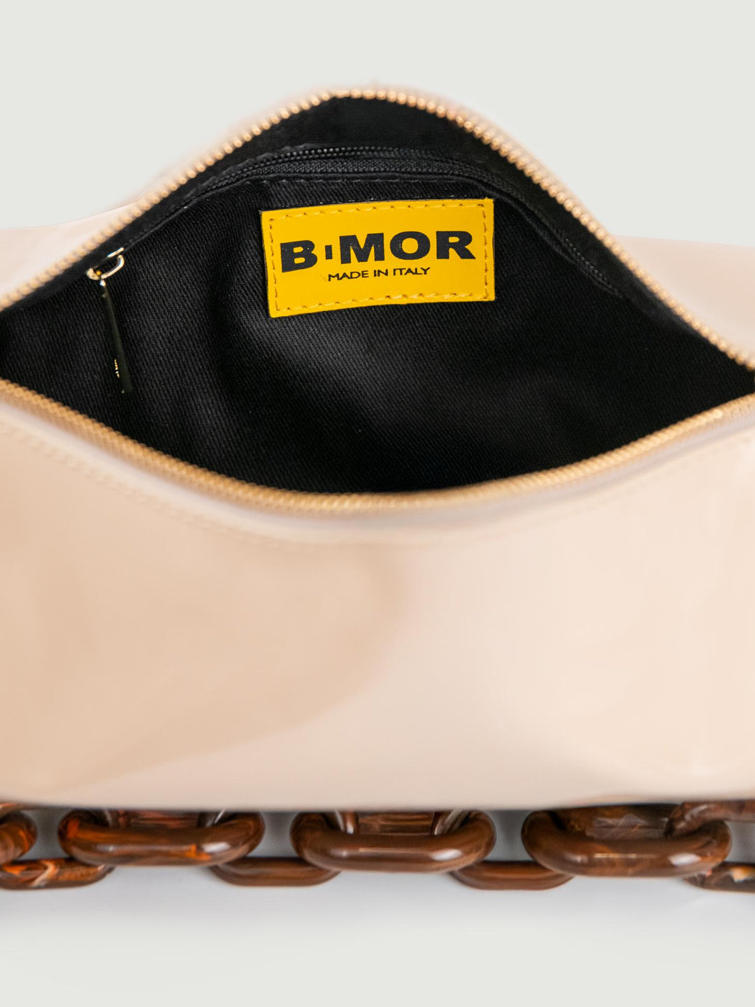 BORSA CILINDRO CIRCULAR BEIGE IN PELLE VERNICE