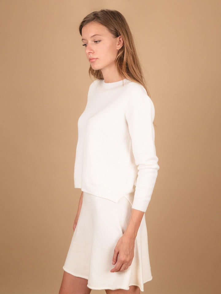 GIROCOLLO IN MAGLIA  CON MICRO SPACCHI LATERALI PANNA 0670/15 0248 BIMOR 