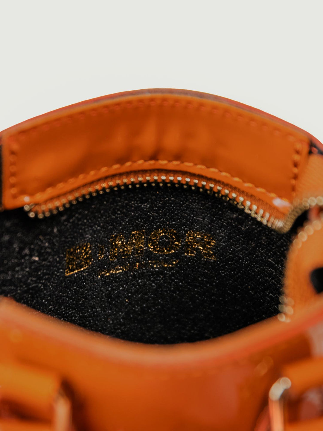BORSA BABY IN PELLE VERNICE MATTONE