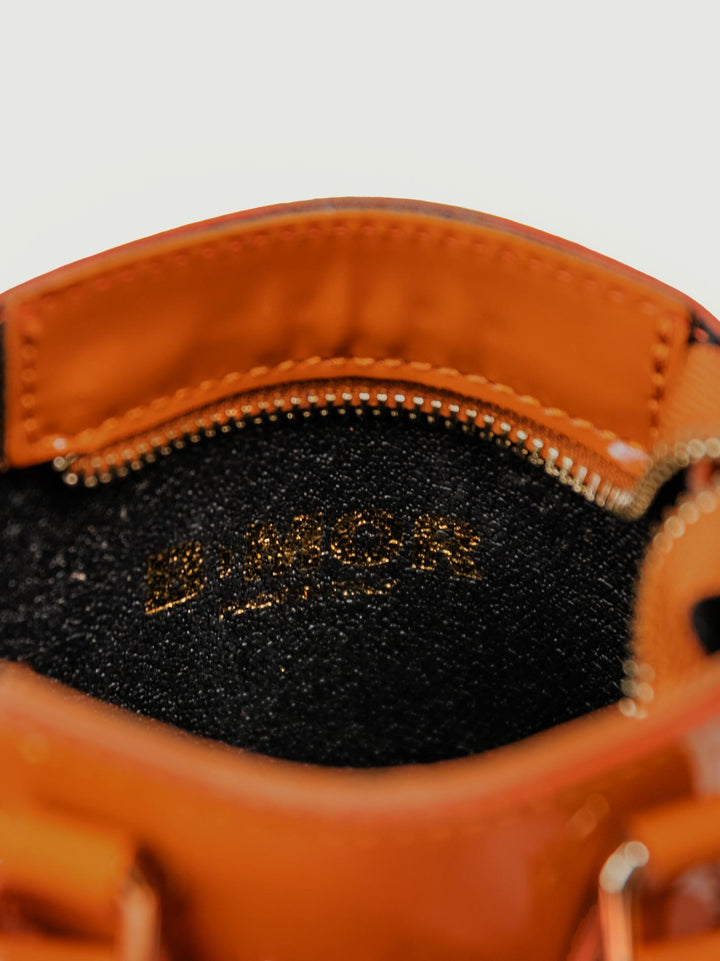 BORSA BABY IN PELLE VERNICE MATTONE