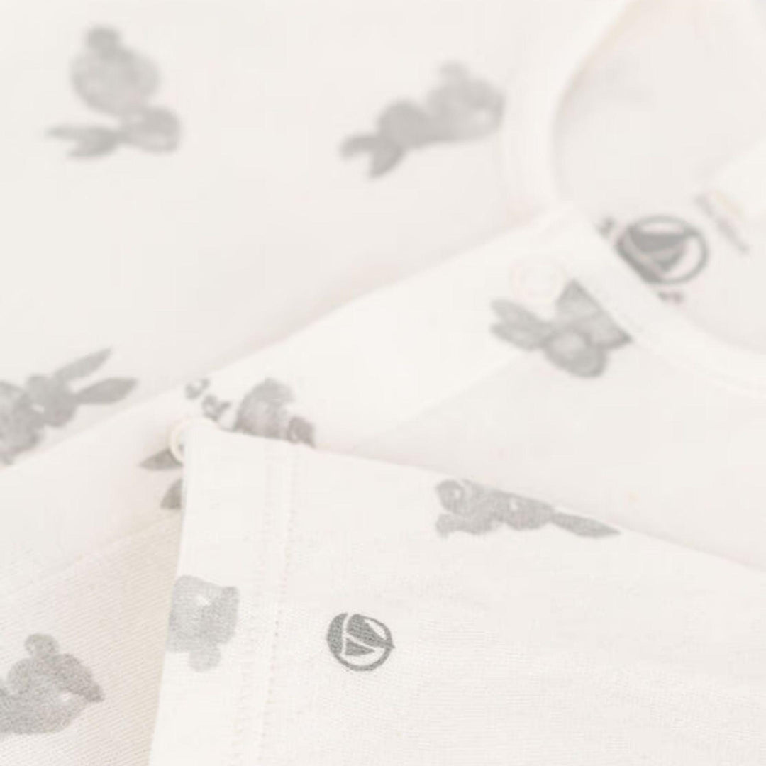 PIGIAMA BEBÈ IN TUBIQUE CON CONIGLIETTI A09G3 01 PETIT BATEAU 
