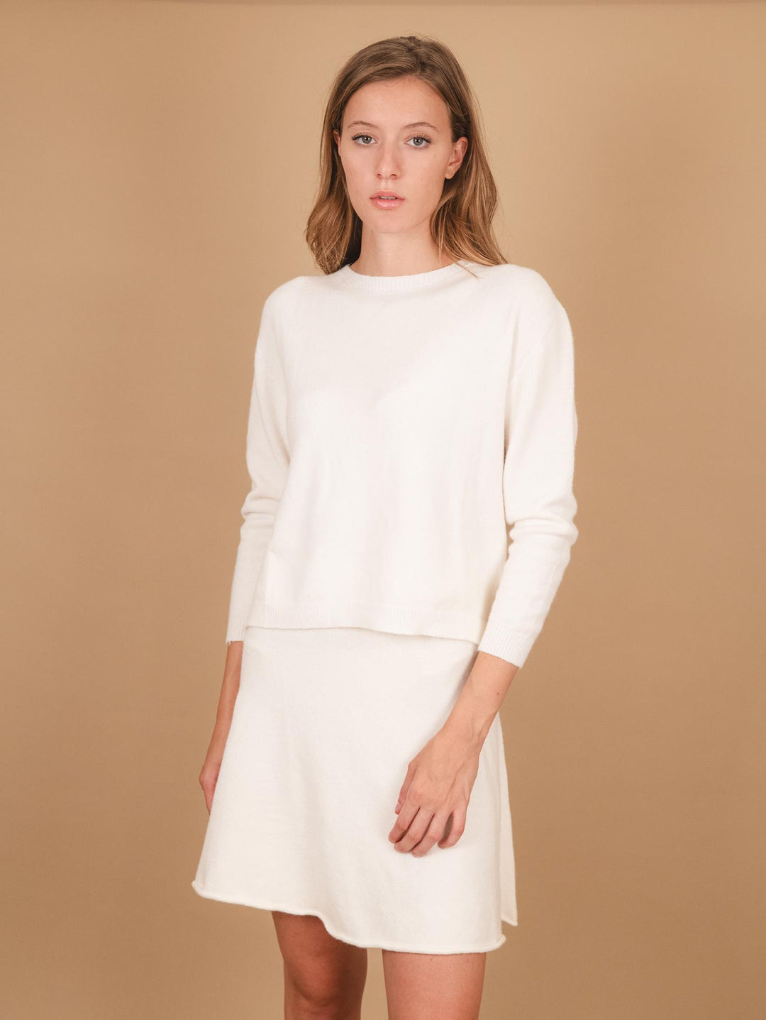 GIROCOLLO IN MAGLIA  CON MICRO SPACCHI LATERALI PANNA 0670/15 0248 BIMOR 