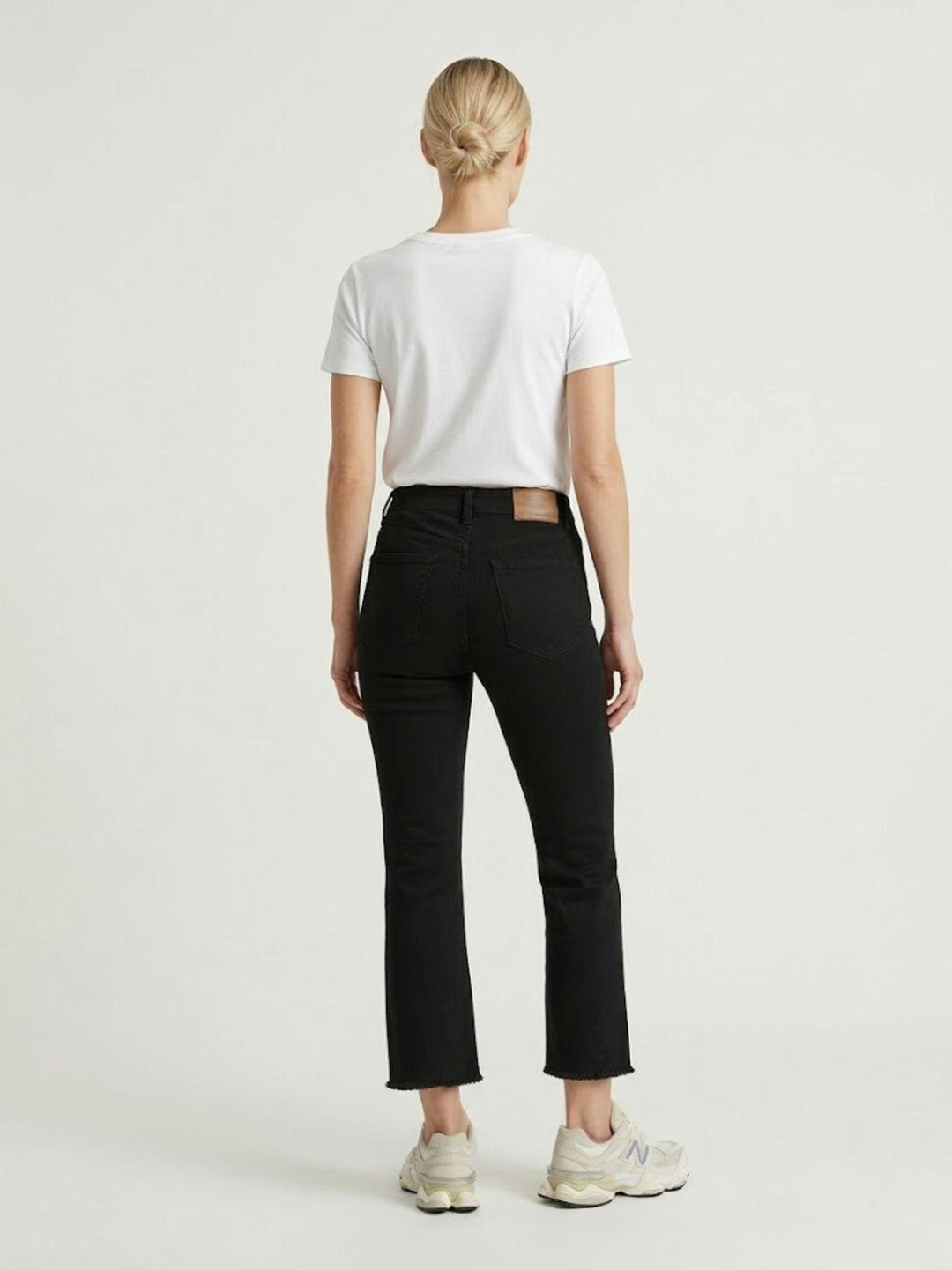 Pantalone a trombetta sfrangiato in cotone nero 80137G190 NERO ANDREA MORANDO 