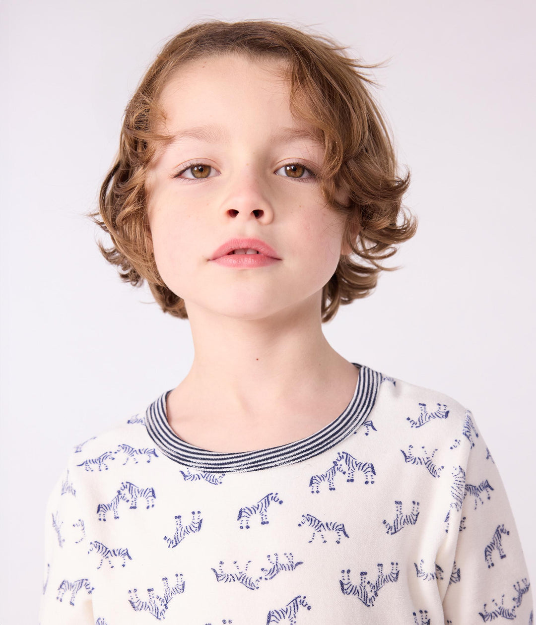 Pigiama in ciniglia con zebre stampate bambino A0DRZ 01 PETIT BATEAU 